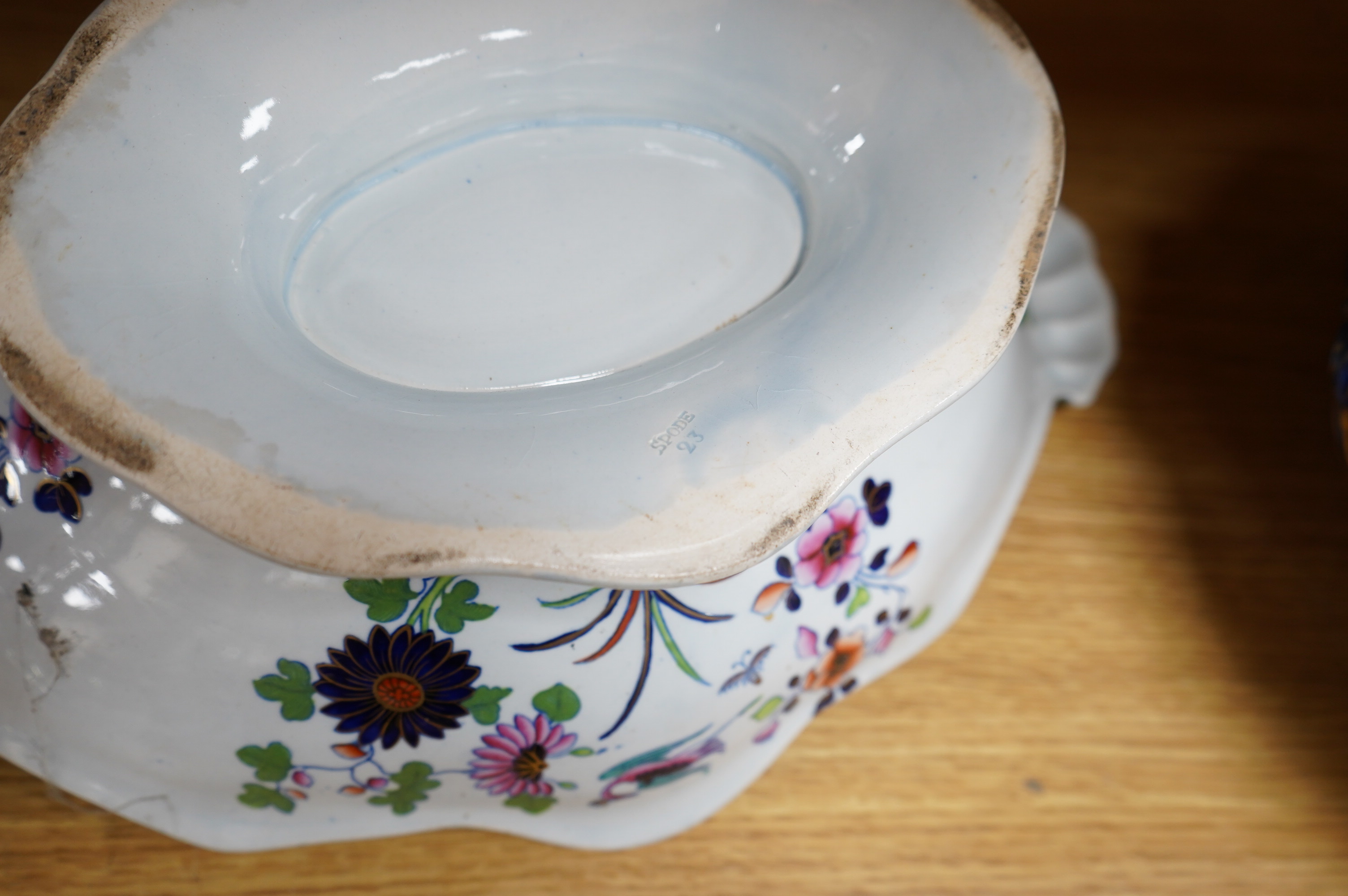 A Spode blue and white oval basket, a Spode two-handled pedestal dish, a Caughley Fisherman pattern saucer dish and two other items, largest 38cm wide. Condition - varies